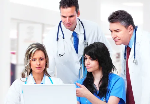 doctors looking at computer