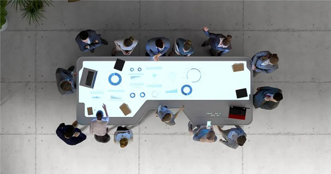 People gathered at meeting table