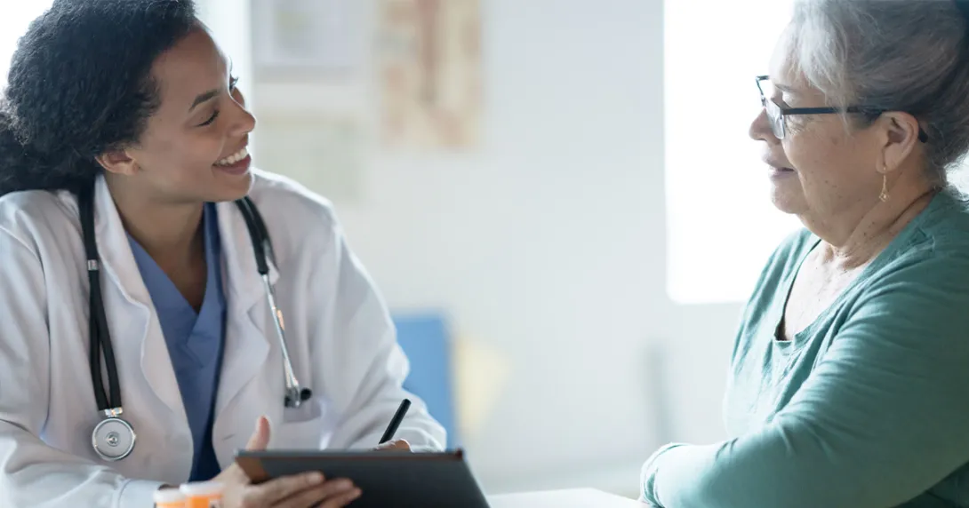 Doctor talking to patient