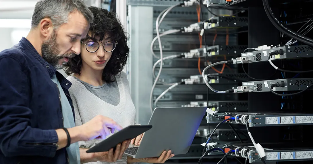 IT and cybersecurity leaders in server room