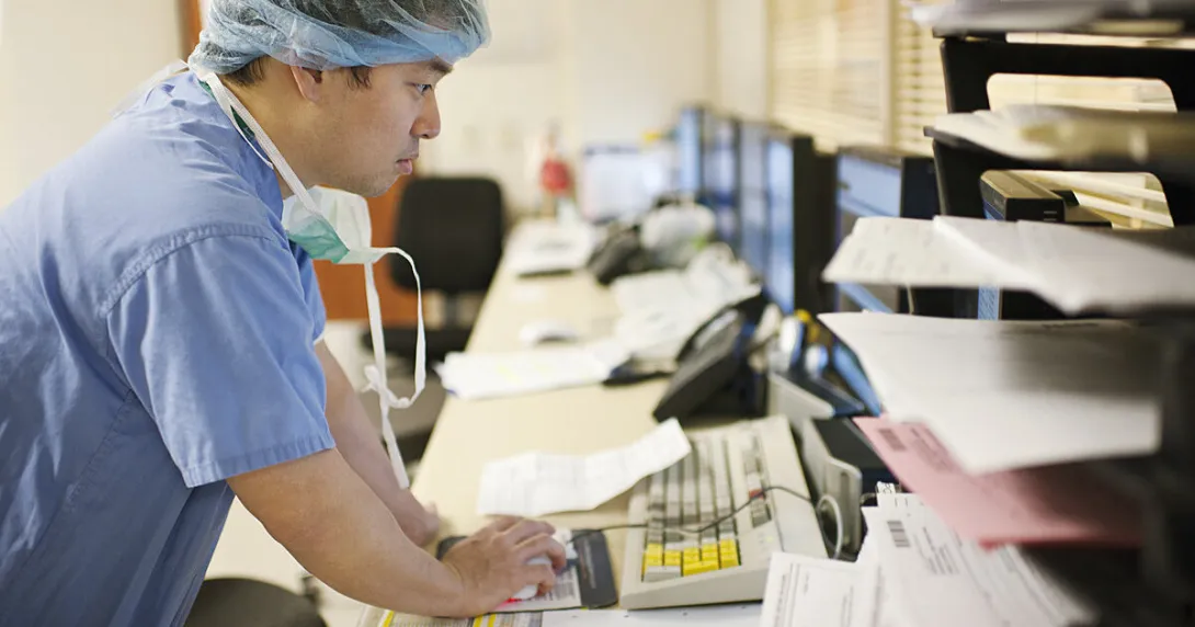 Doctor using EHR in hospital