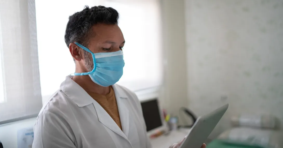 A doctor with a tablet