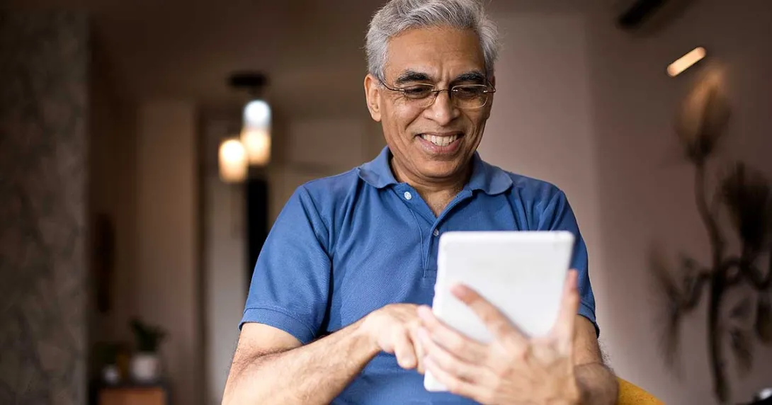 man holding a tablet