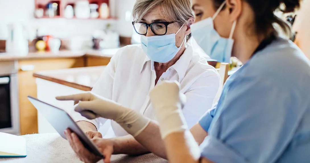 Healthcare worker with tablet