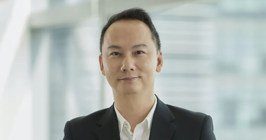 Portrait headshot of Dr Adam Chee, National University of Singapore