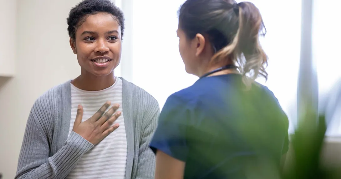 Healthcare worker talking to patient