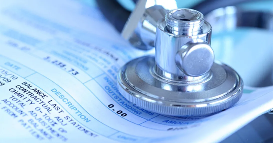 Cancer care bill and stethoscope