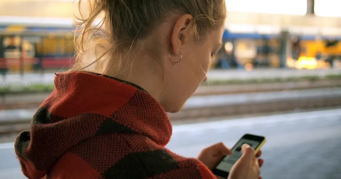 A person looking at their smartphone