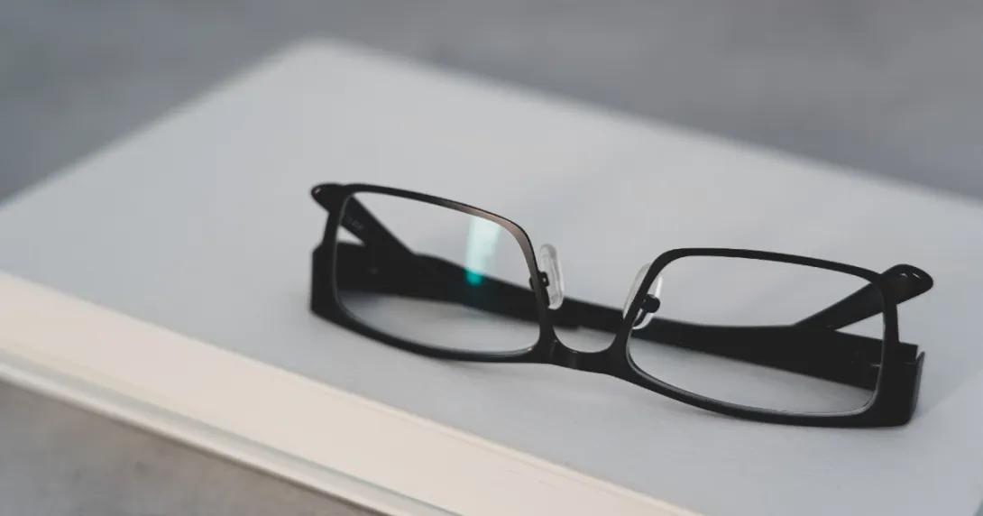 Eyeglasses on notebook