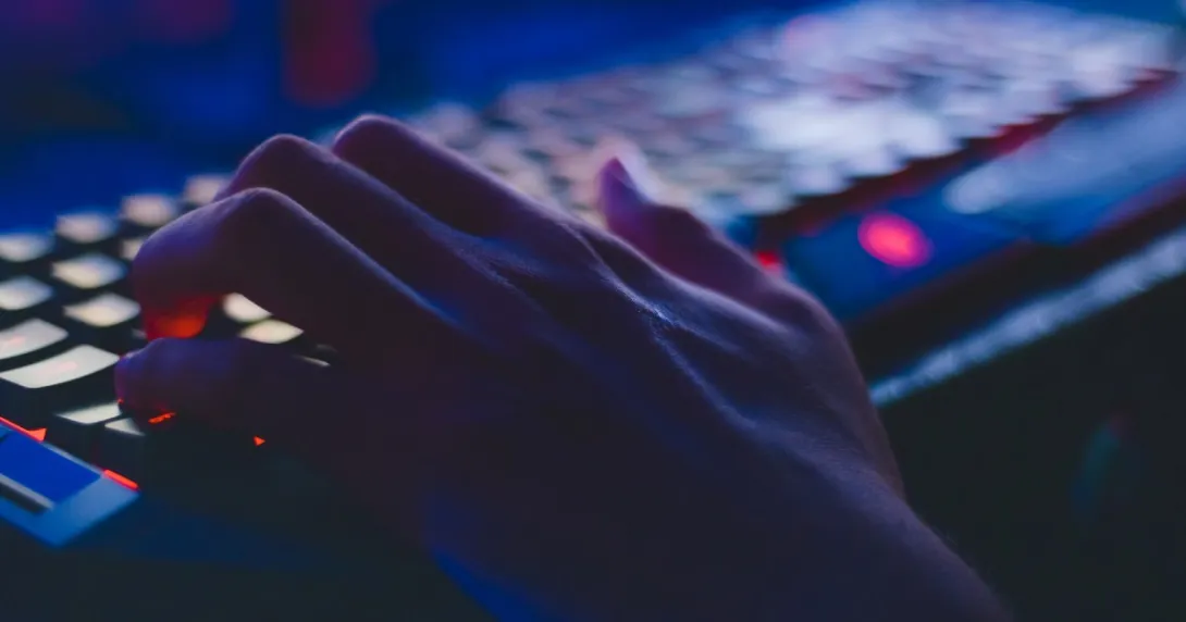 A hand on a keyboard
