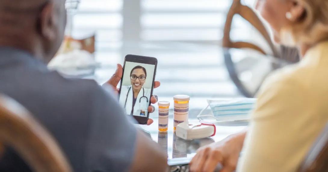A doctor on a mobile phone