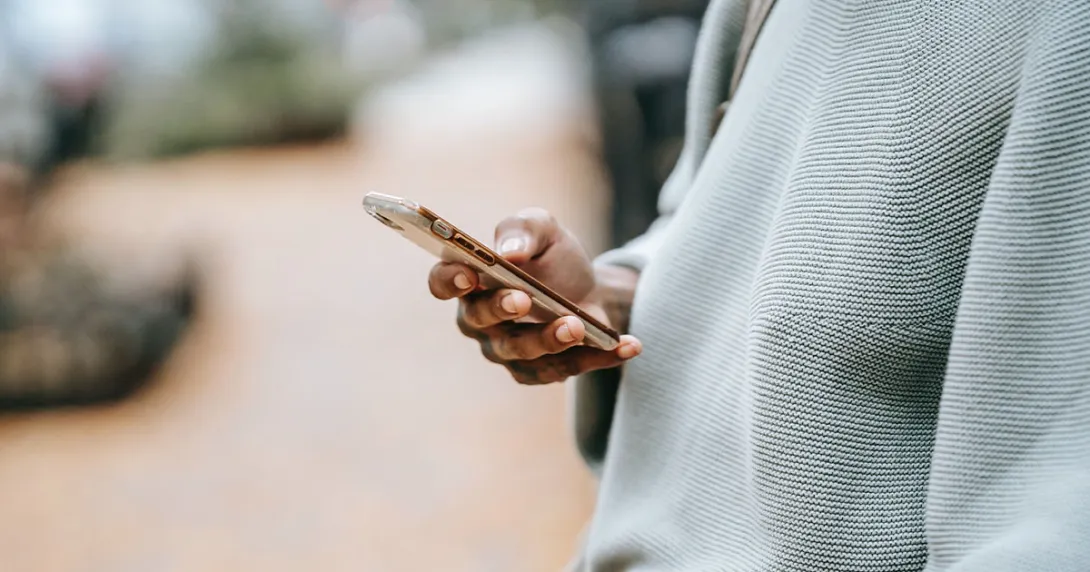 Person holds smartphone