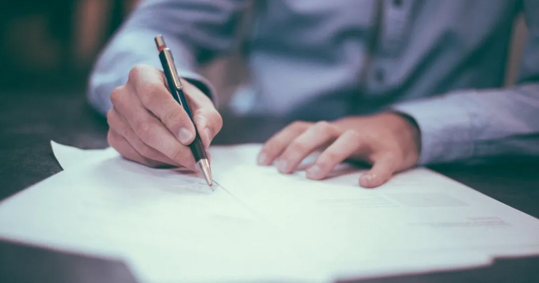 A person signing a document