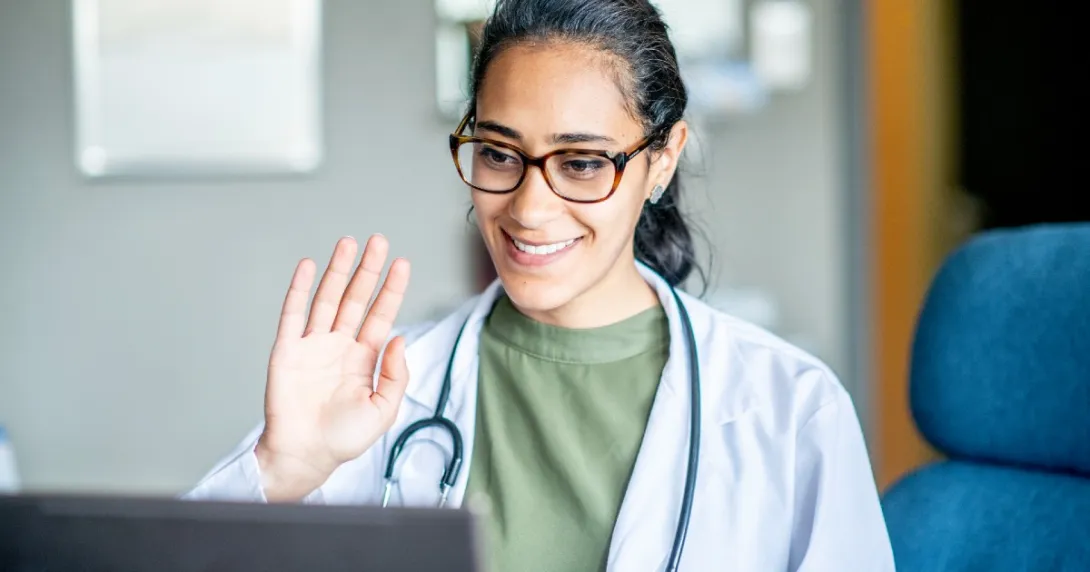 A medical professional starts a telehealth visit