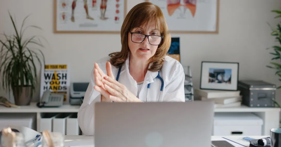 A doctor video chatting with a patient