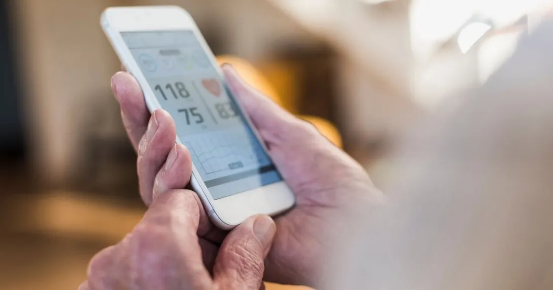 A person checking their health data in a mobile health app