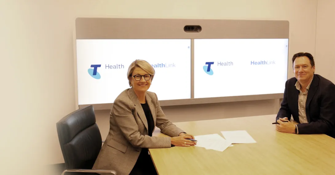 Telstra Health and HealthLink representatives following the signing of their sale deal