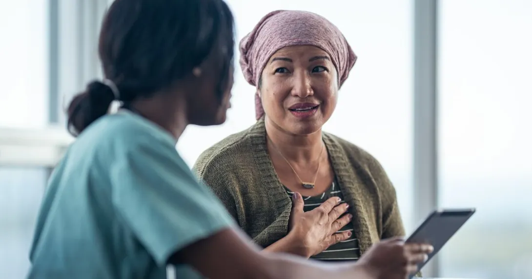 A cancer patient consulting with their doctor