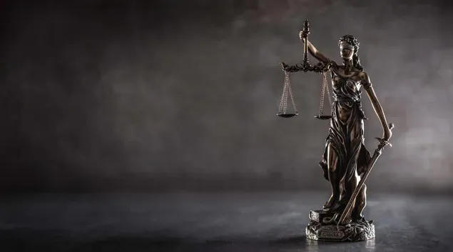Statue of justice with scales