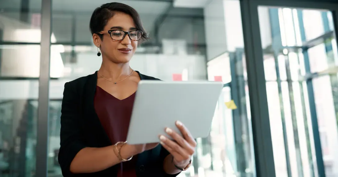 mental health provider looks at her business information on a tablet