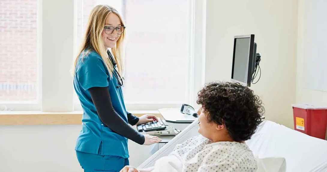 Healthcare worker talking to patient