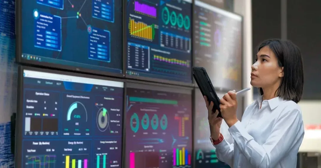 Healthcare employee assesses analytics dashboards