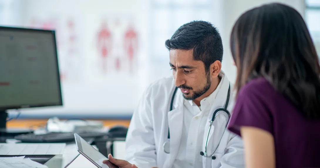Doctor and patient with computer