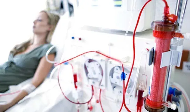 Woman receives dialysis