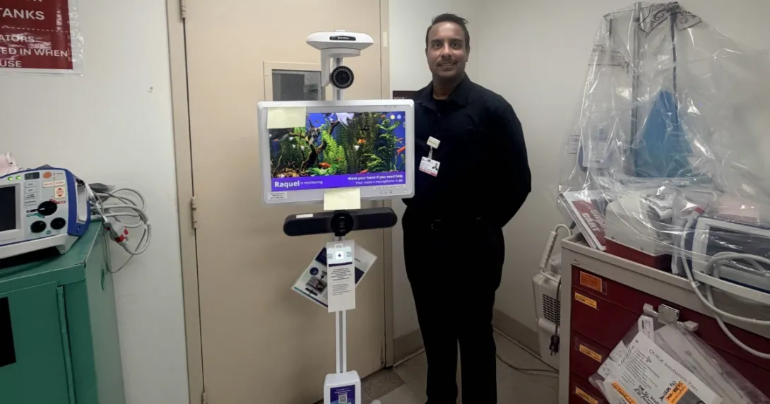 Harsha Gopinath of Prime Healthcare with a tele-sitter cart