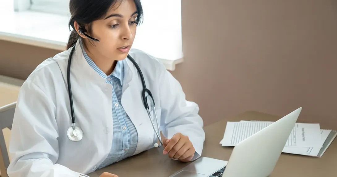 Physician dictates clinical note into EHR