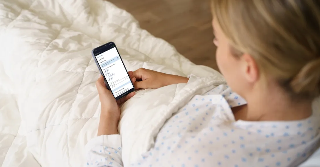 patient holding a smartphone