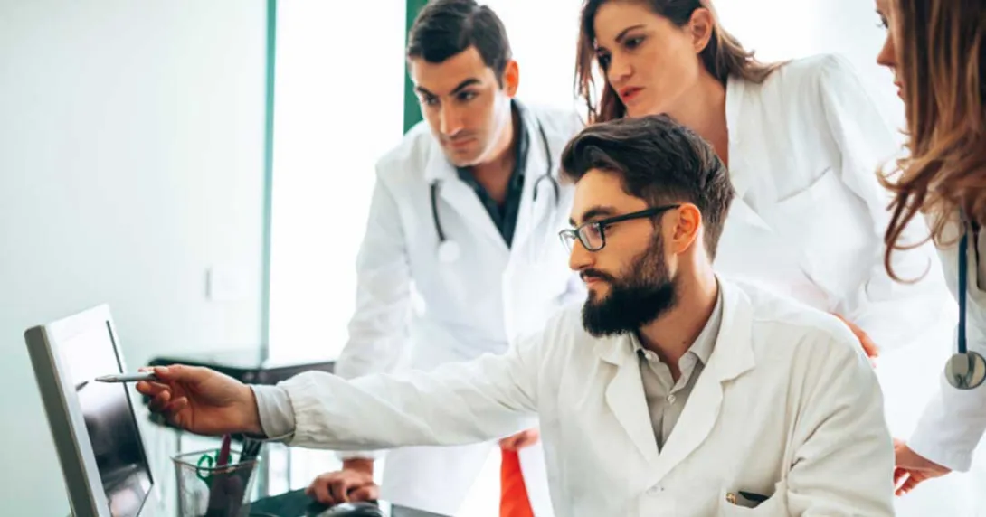Group of healthcare professionals at a screen