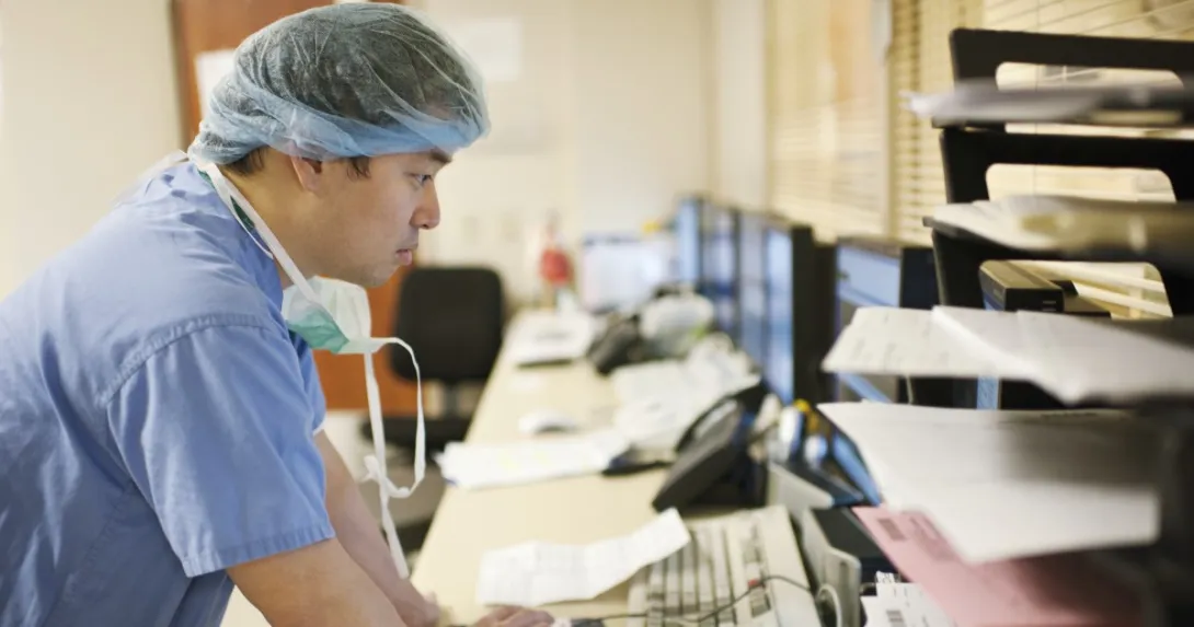 Doctor on computer in hospital
