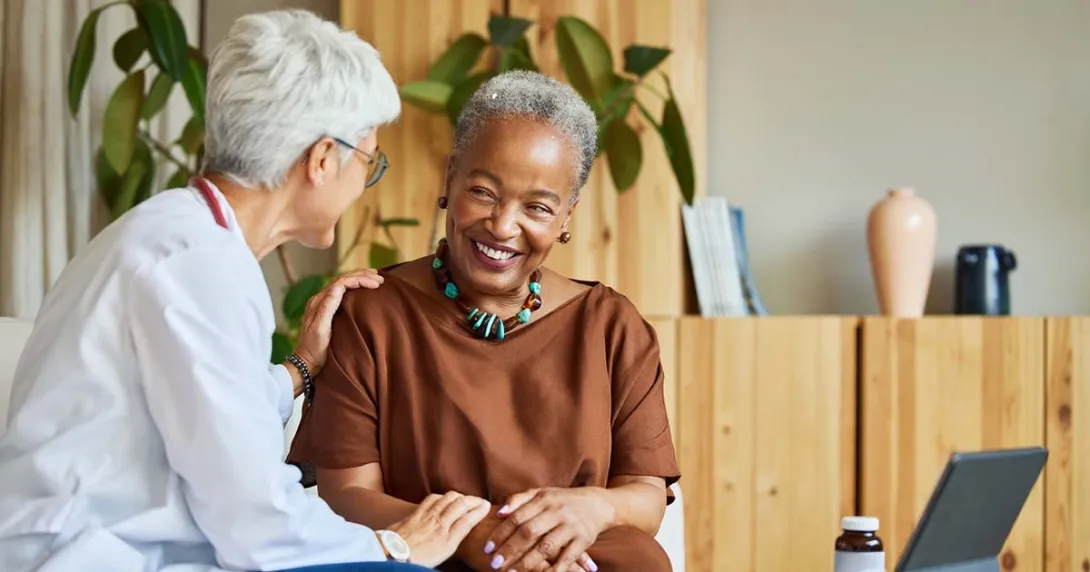 doctor with patient in home