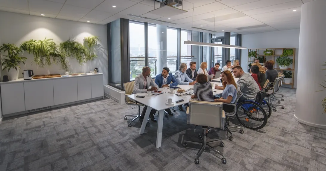 Health planners gathered at a table for a meeting