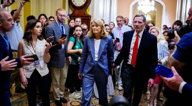 Sen. Lisa Murkowski (R-AK) and Sen. John Barrasso (R-WY) in the Capitol after the Senate vote-a-rama on July 1.
