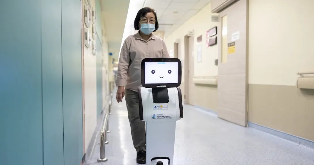 The wayfinding robot EDi guiding a visitor in the hospital