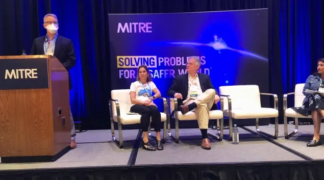 From left: Dave Hill of MITRE, Lorraine Wickiser of CMS and Pooja Babbrah of Point of Care, address post-acute care specialists during HIMSS23.