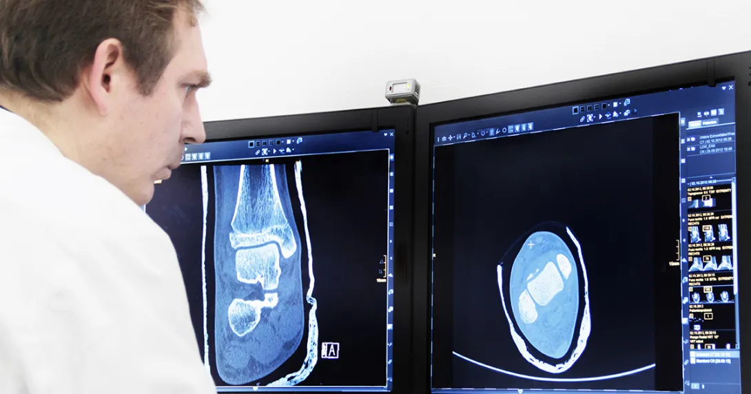 Doctor looking at medical images on PACs