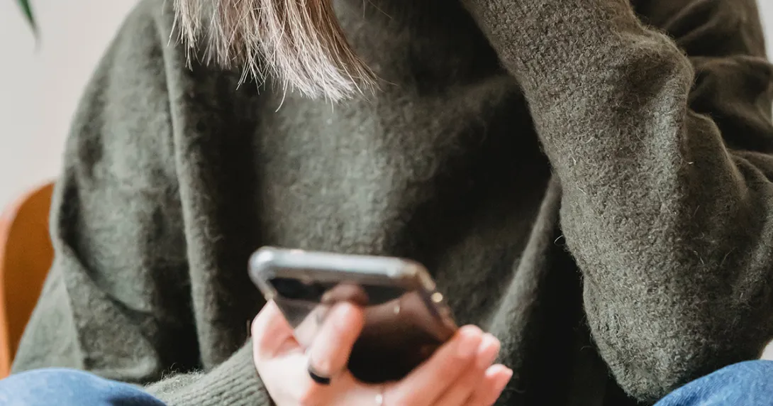 Patient using behavioral health app on smartphone