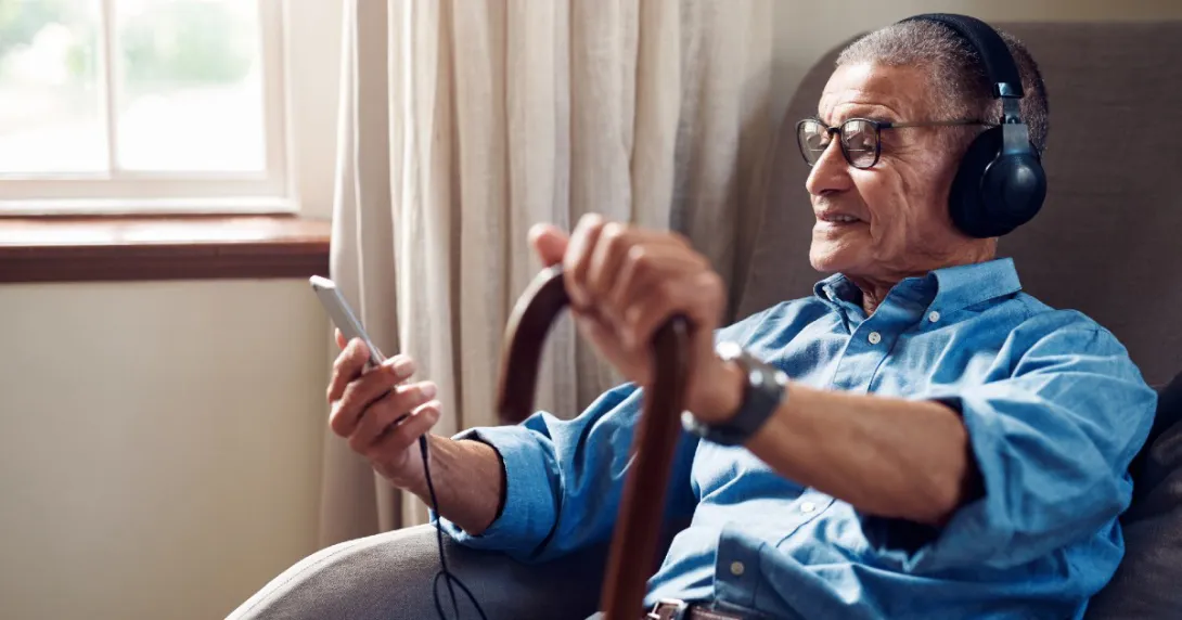 Senior consults with physician via telehealth with smartphone