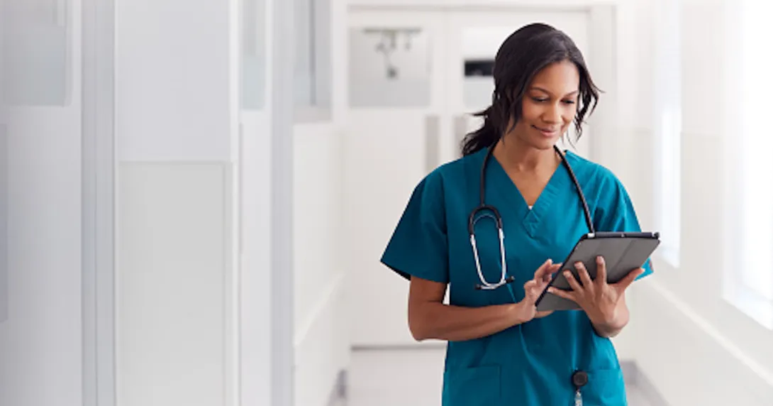 Healthcare worker using tablet