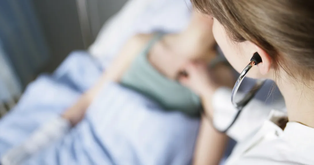 doctor examining a patient