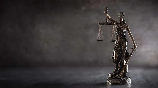 Statue of justice holding the scales