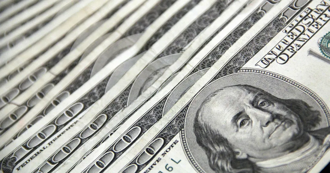 $100 bills laid out in fan succession