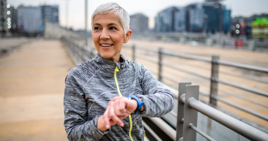 Person in exercise clothes with smartwatch