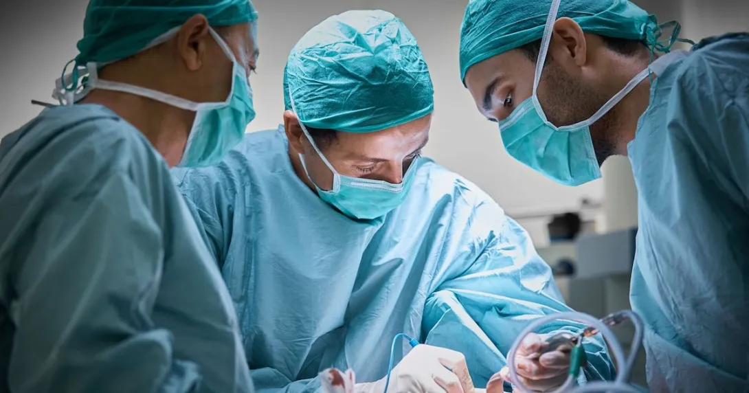 Surgeon and medical team performing surgery