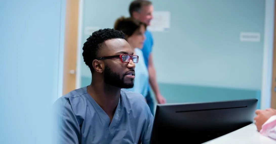 Healthcare worker using a computer