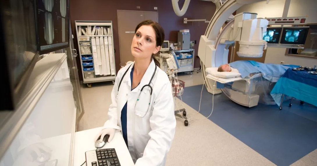 A radiologist checking a patient's scan