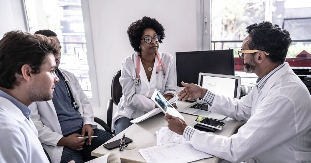 Doctors holding a conference discussion